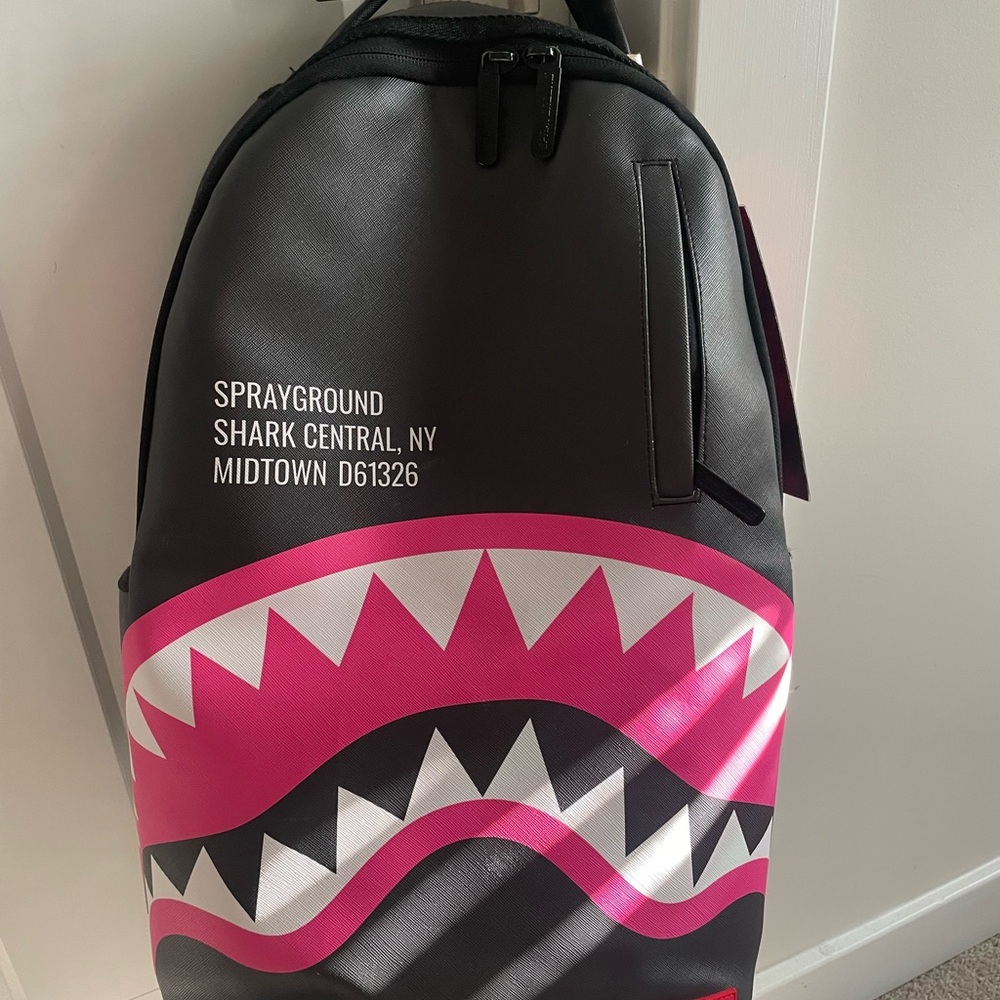 Sprayground Black and Pink Shark Backpack